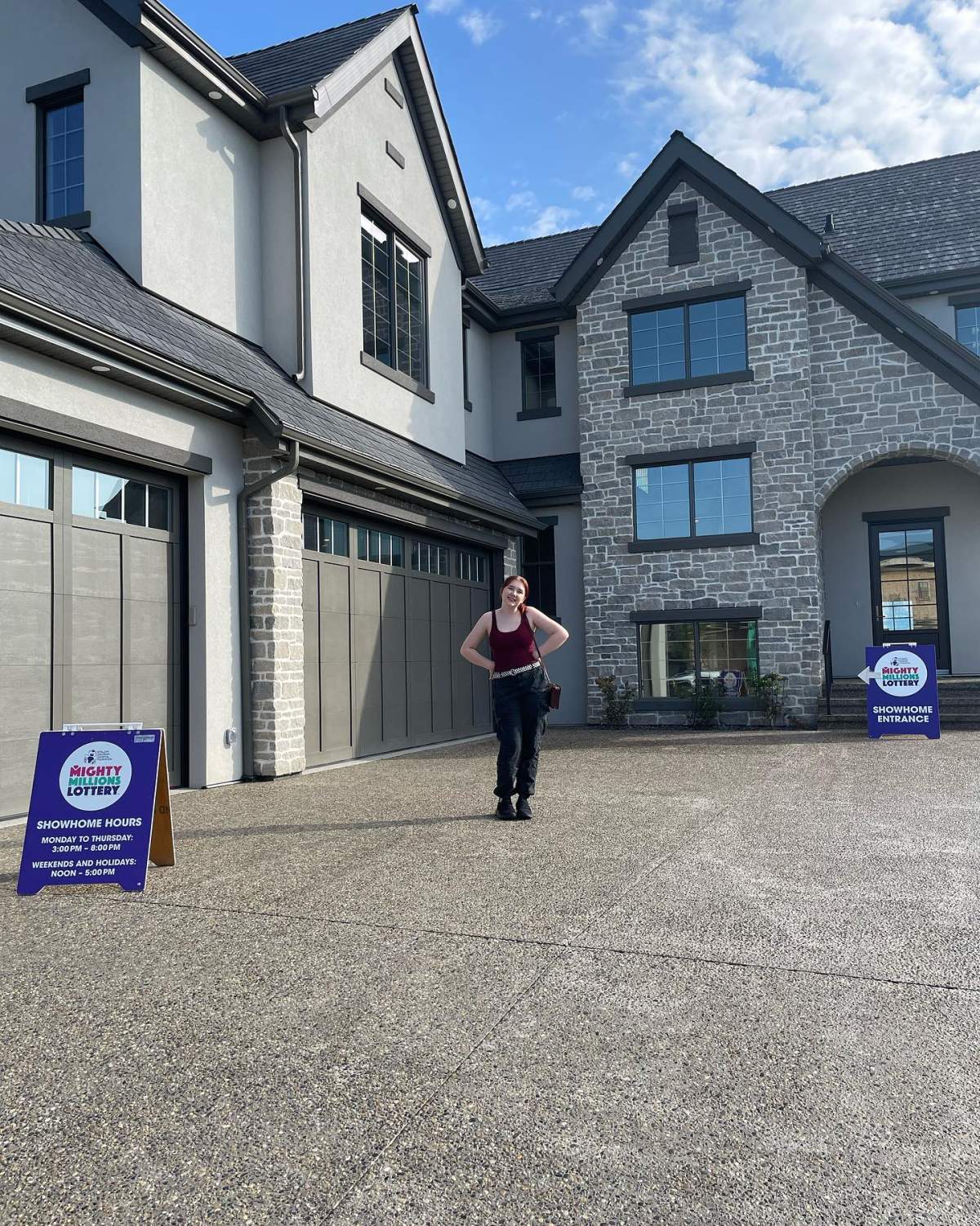 Cadence Herman outside of the Mighty Millions Lottery Home in 2023.