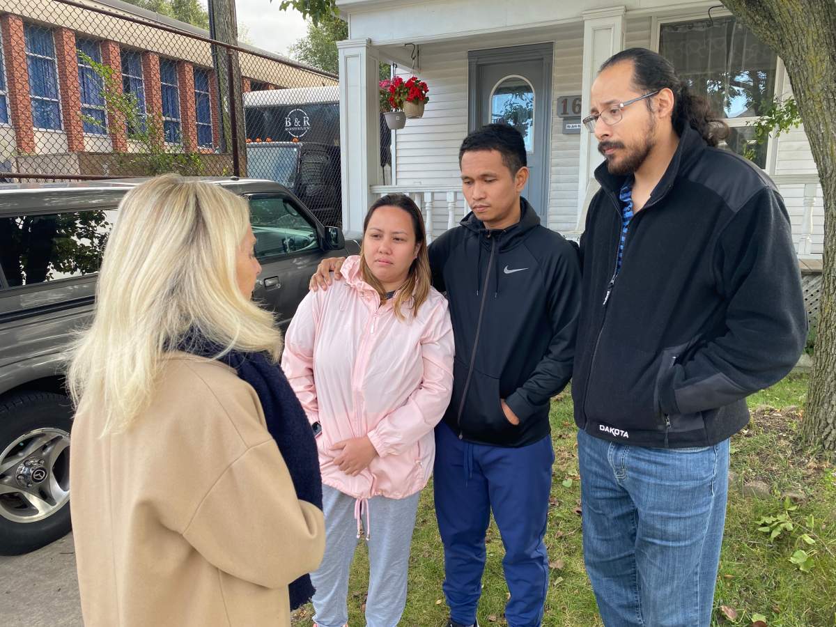 Global News’ Catherine McDonald speaks to family members after the fatal collision.