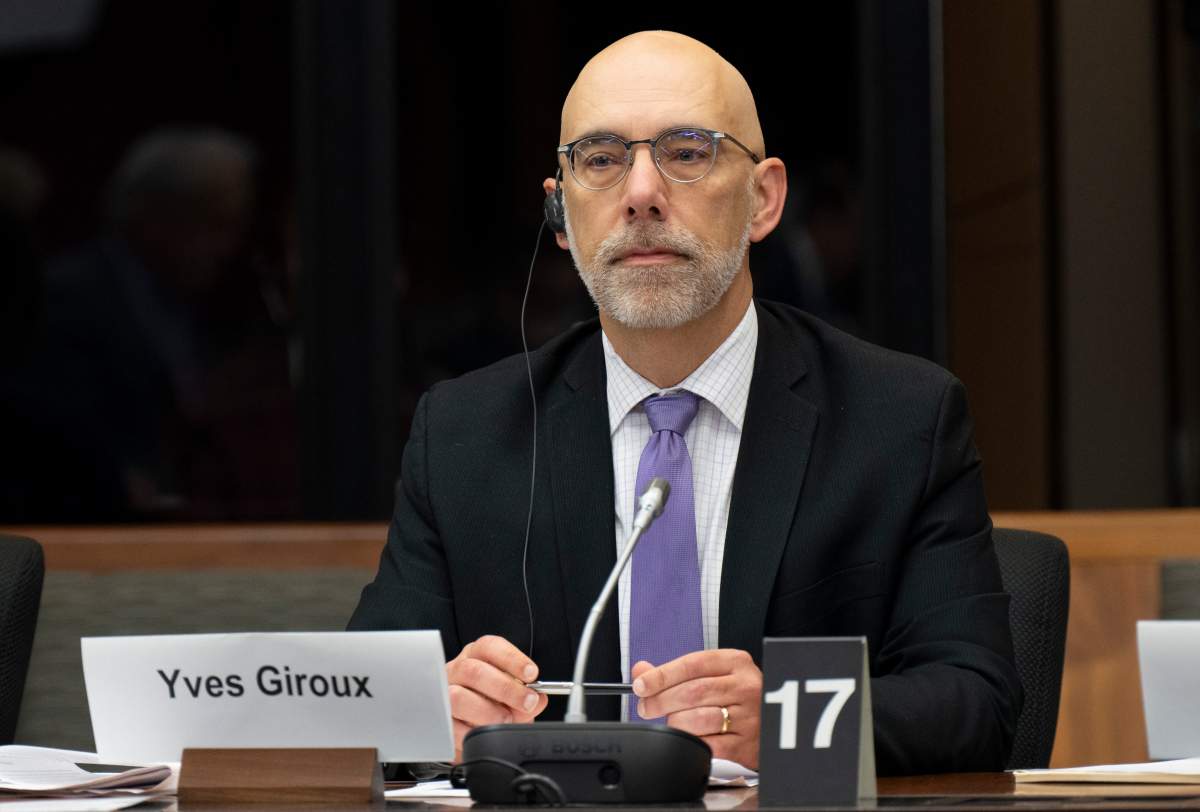 Parliamentary Budget Officer Yves Giroux waits to appear before appearing at the Senate Committee on National Finance, Tuesday, October 25, 2022 in Ottawa. THE CANADIAN PRESS/Adrian Wyld