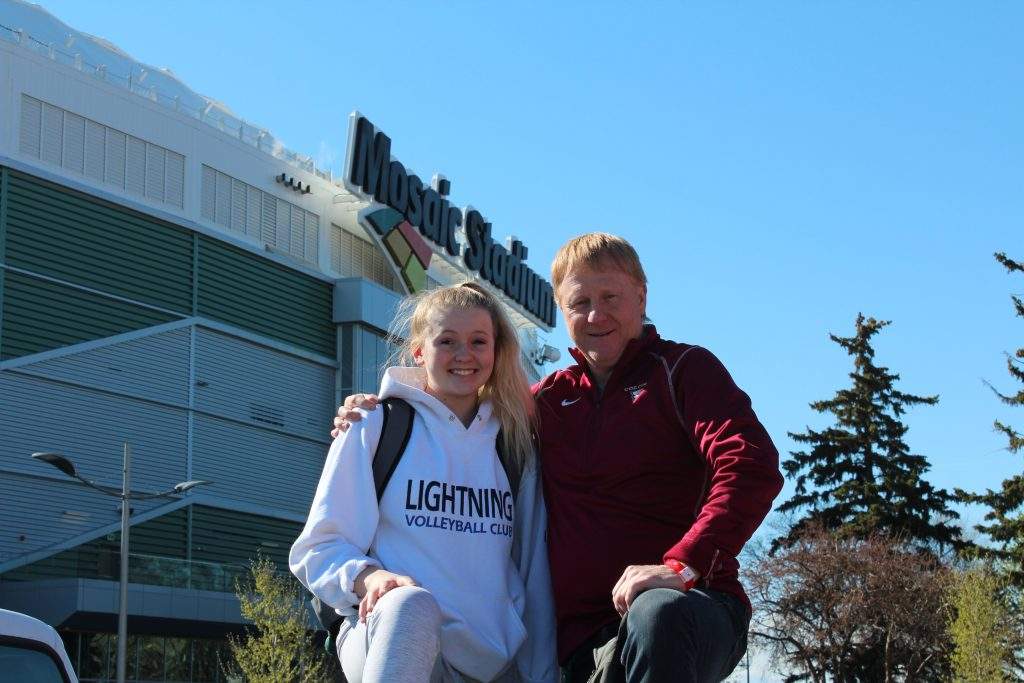 University of Saskatchewan basketball star Logan Reider (left) with her father Shane (right) who serves as offensive coordinator with the Saskatoon Hilltops.