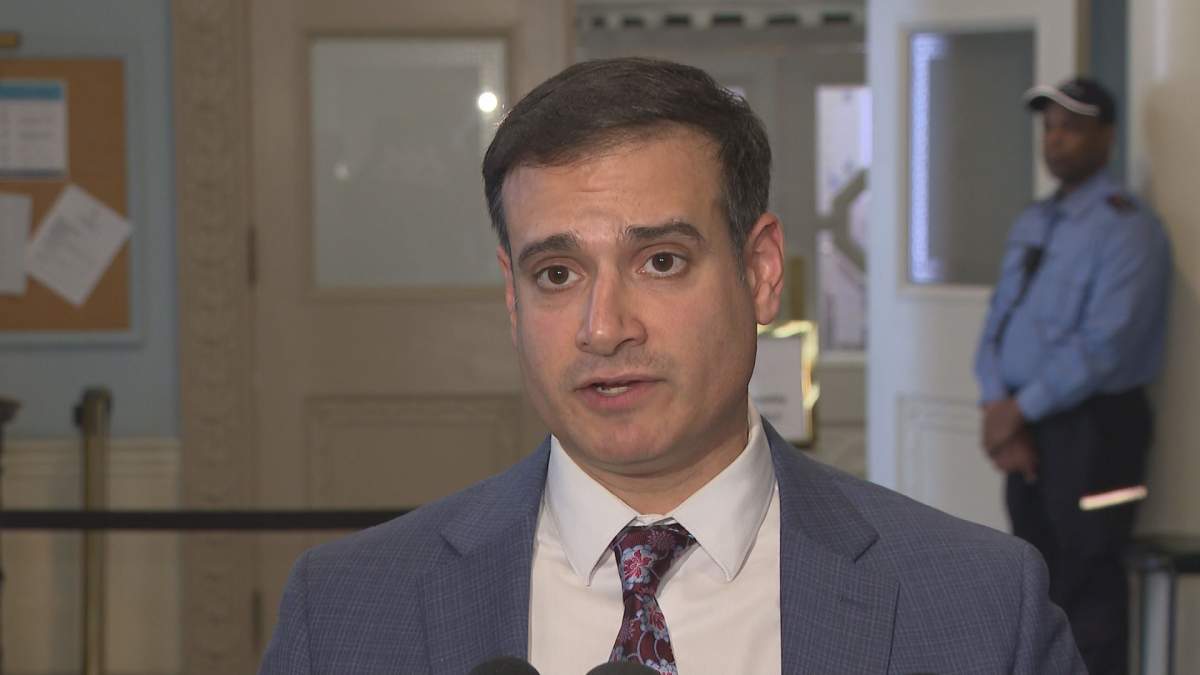 Zach Churchill, leader of the Nova Scotia Liberal Party, speaks with reporters Oct. 25, 2023.