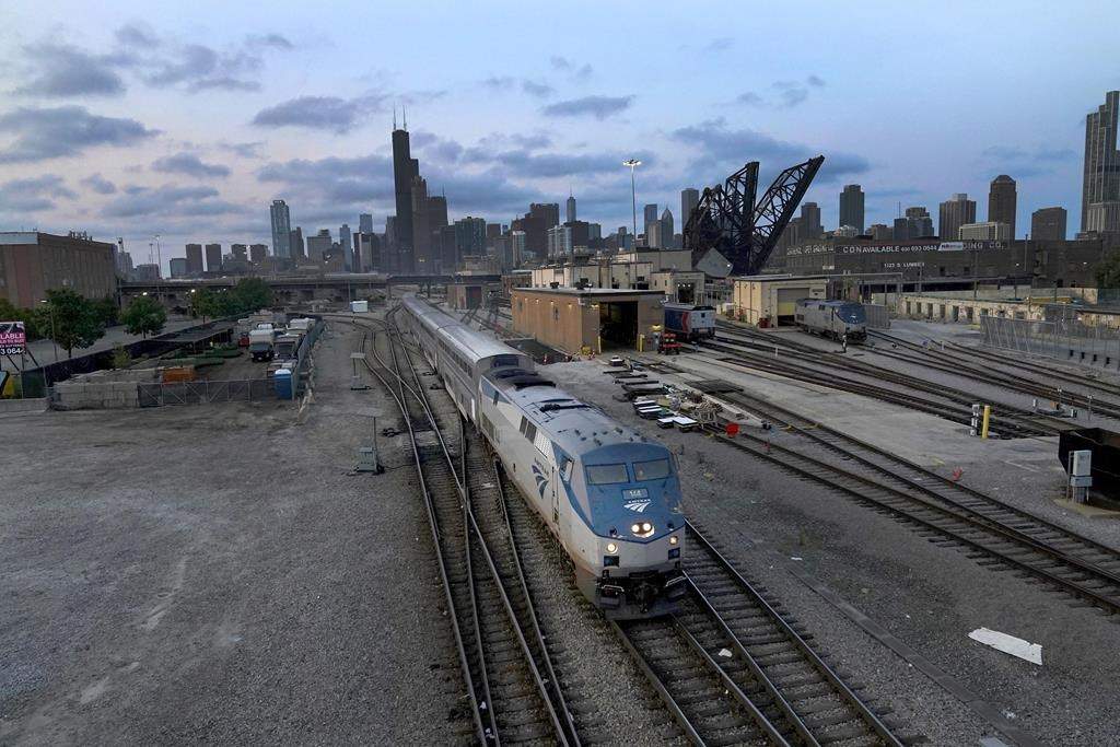 An Amtrak passenger train departs Chicago on Wednesday, Sept. 14, 2022, in Chicago. Amtrak is making a sales pitch to connect its lines in Detroit to Via Rail tracks across the border, hoping to lay the ground for passenger service between Toronto and Chicago.
