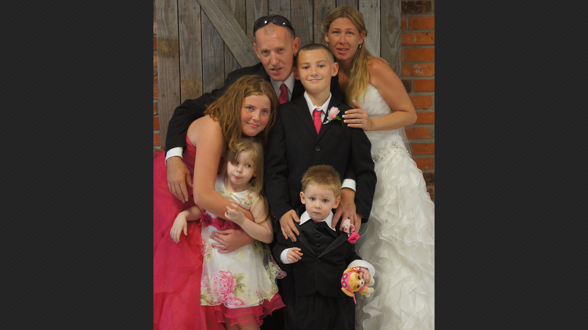 Jason Ladouceur along with wife and four youngest children. 