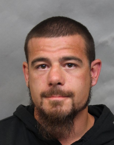 Police have issued a warrant for Michael Bebee of Toronto in connection with the murder of 29-year-old Shemar Powell-Flowers in Greektown this past summer.
