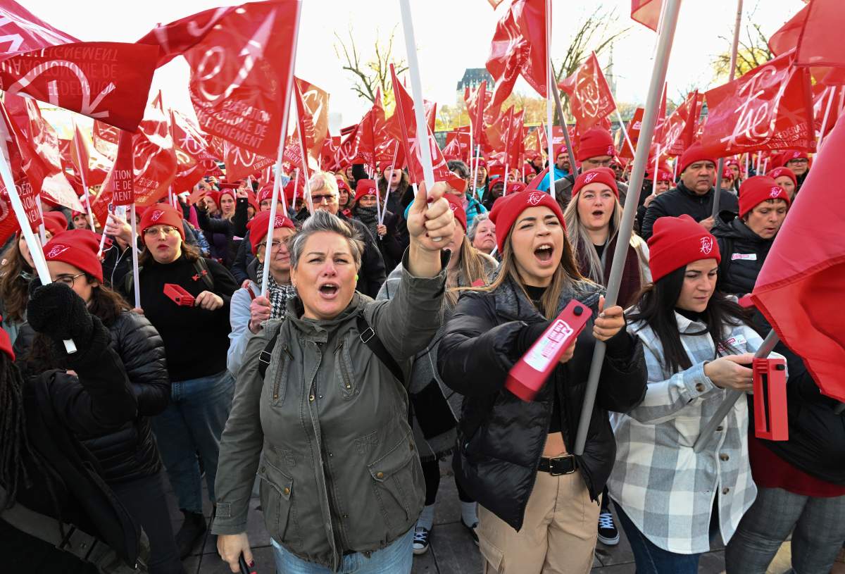 Teachers of the Federation autonome de l’Enseignement (FAE) demonstrate as they present their negotiation demands, Thursday, Oct. 27, 2022 in front of the legislature in Quebec City.