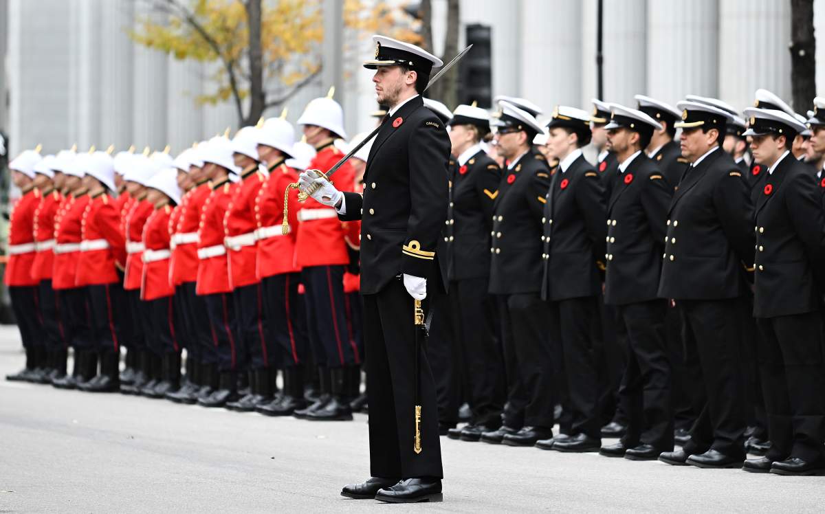 Members of the Canadian Armed Forces stand to attention during a Remembrance Day ceremony in Montreal, Saturday, November 11, 2023.