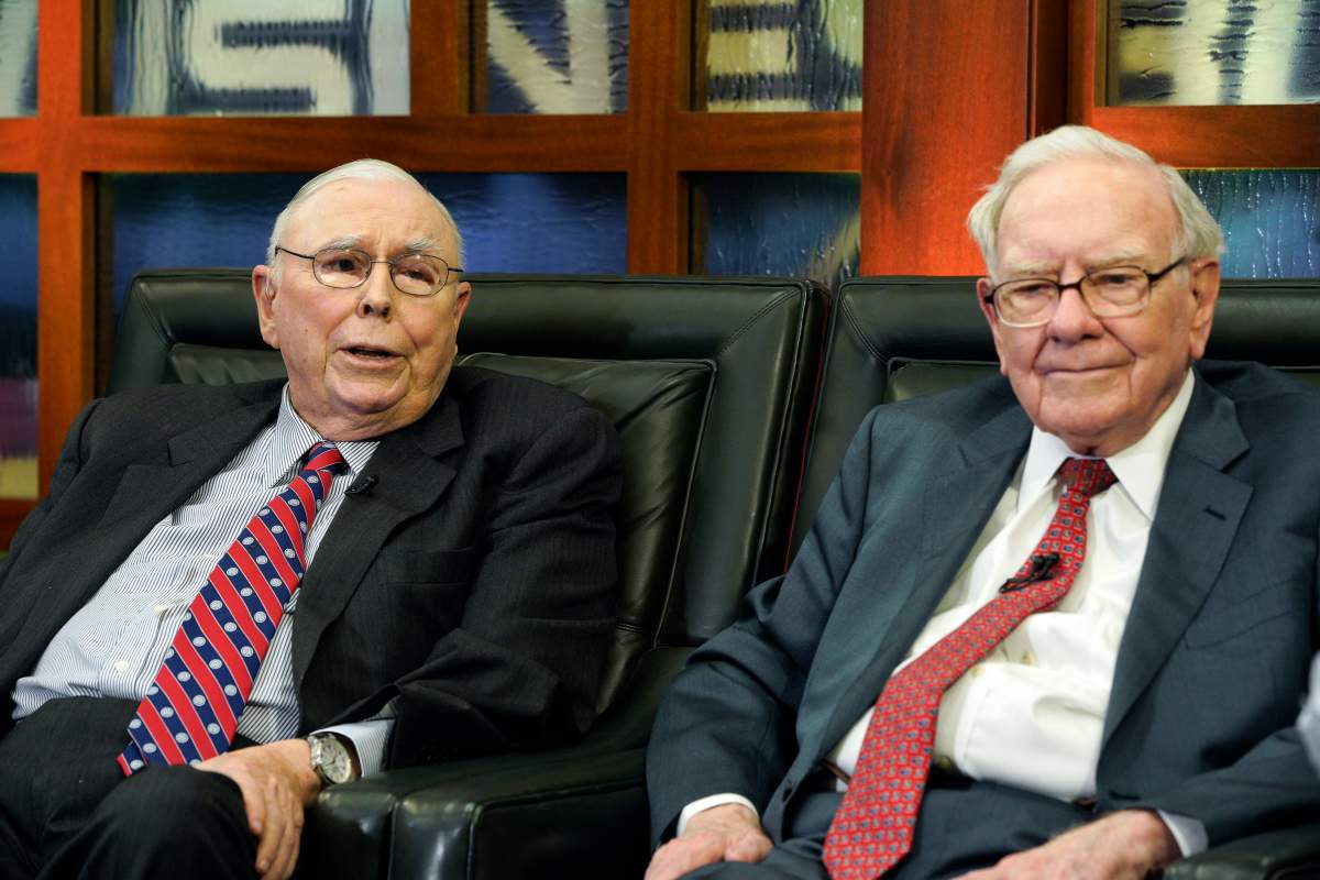 FILE – Berkshire Hathaway Chairman and CEO Warren Buffett, right, and his Vice Chairman Charlie Munger, left, speak during an interview in Omaha, Neb., Monday, May 7, 2018, with Liz Claman on Fox Business Network’s “Countdown to the Closing Bell”. Munger, who helped Warren Buffett build Berkshire Hathaway into an investment powerhouse, died Tuesday, Nov. 28, 2023, at a California hospital the company announced.. He was 99. (AP Photo/Nati Harnik, File)