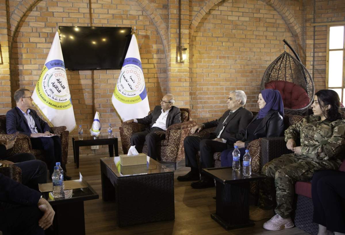 Canadian diplomats, left, in northeast Syria to secure the release of Kimberly Polman, Oct. 2022.