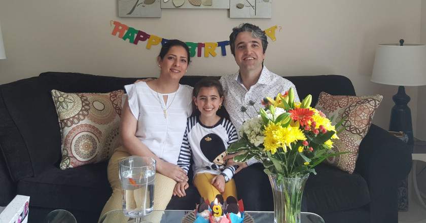 Hamed Esmaeilion with wife Parisa and daughter Reera on her ninth birthday.