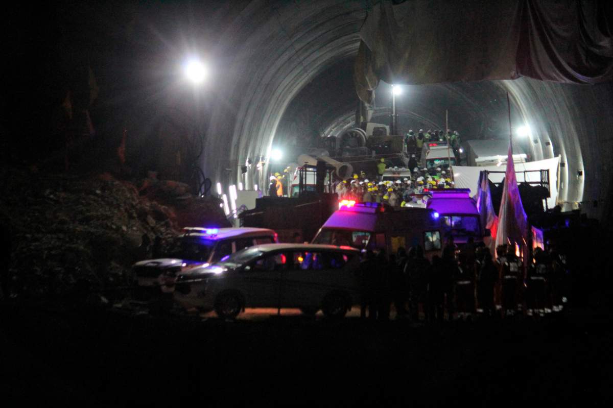 Ambulances drive out of the tunnel carrying rescued workers in Silkyara in the northern Indian state of Uttarakhand, India.