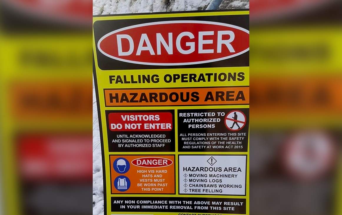 A sign warning the public of wildfire mitigation work.