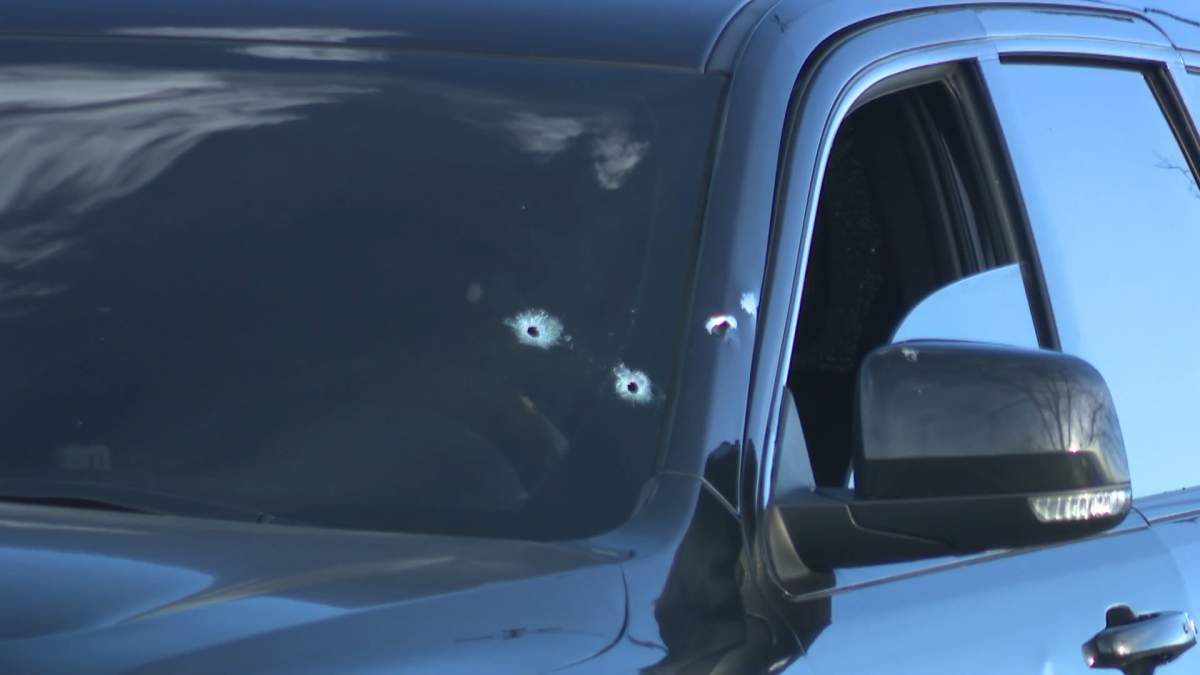 Bullet holes in a vehicle in the parking lot of the Trans Canada Centre in northeast Calgary following a fatal Nov. 13 shooting.