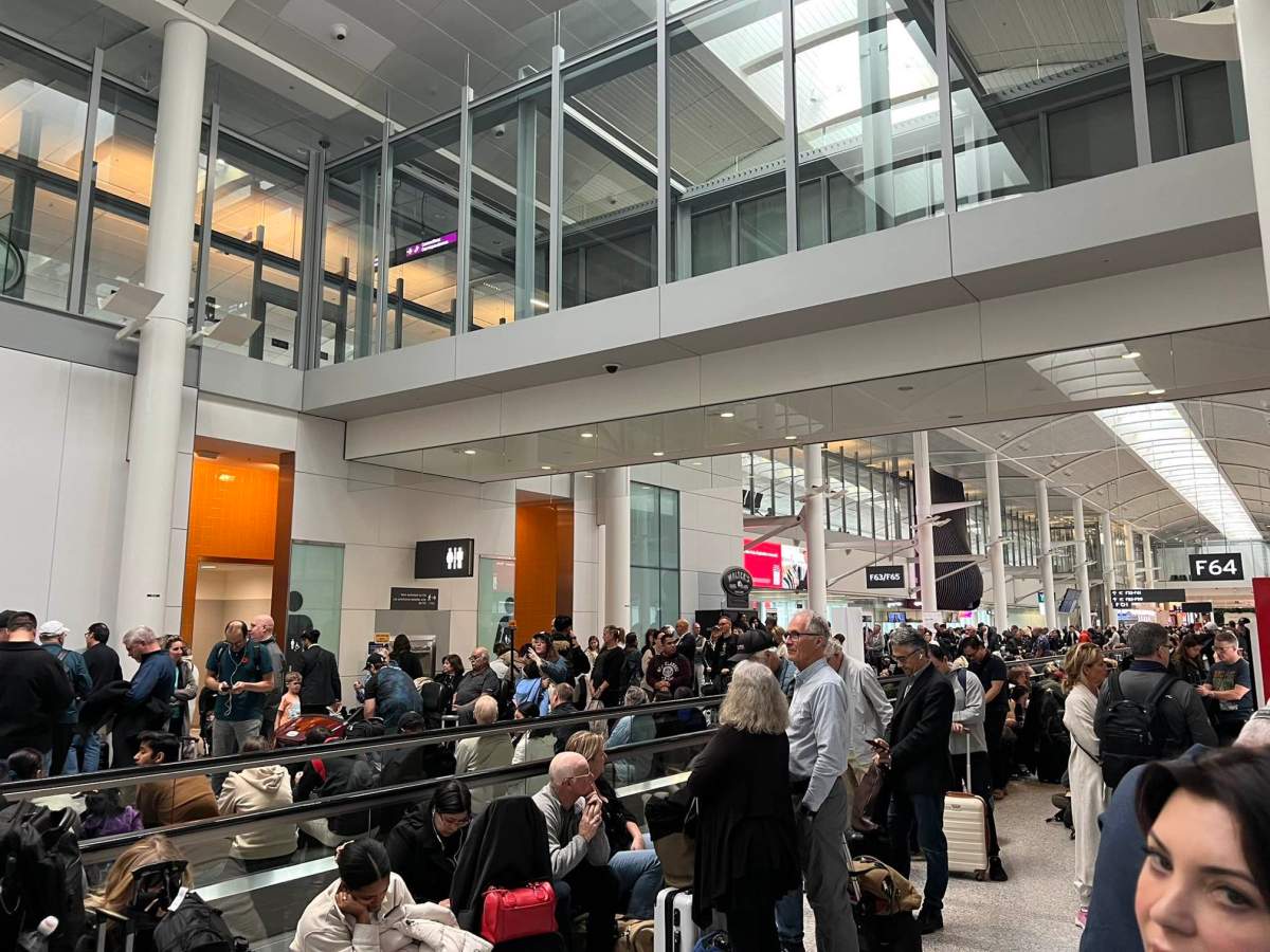 Crowds of passengers at Toronto Pearson Airport’s Terminal 1 on Nov. 9, 2023.