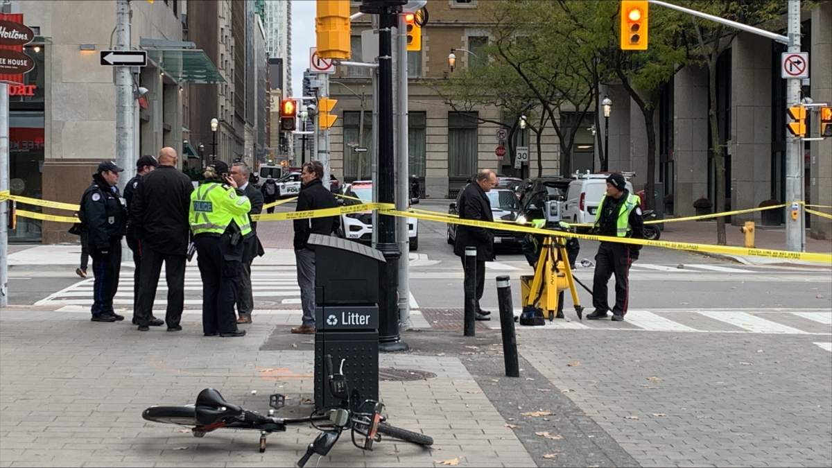 Investigators on scene after a fatal hit-and-run in downtown Toronto on Nov. 14, 2023.