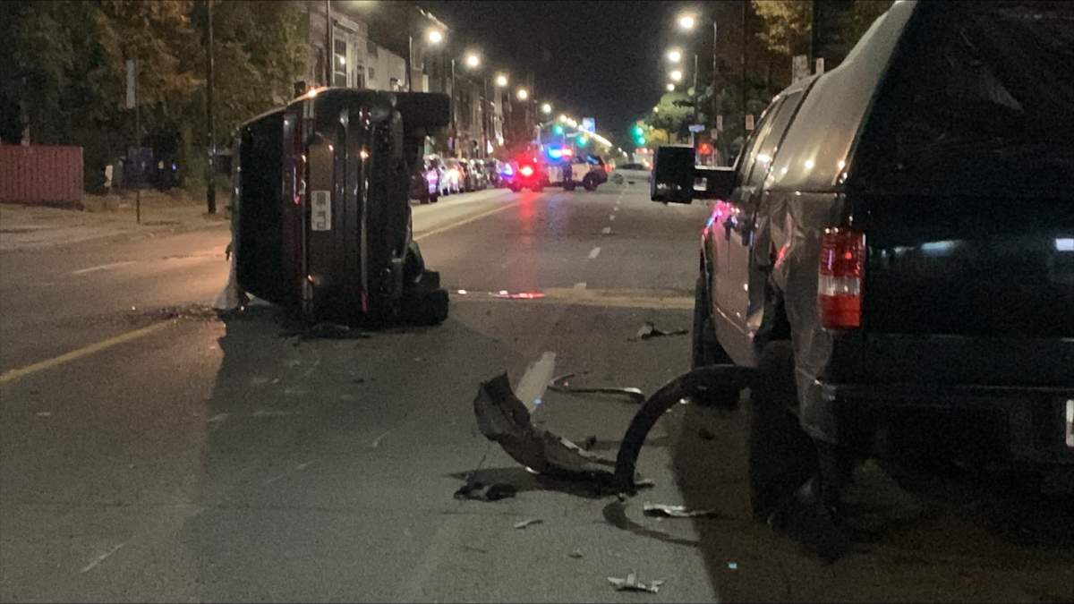 A vehicle seen on its side near Dundas Street and St Johns Place on Nov. 3, 2023.