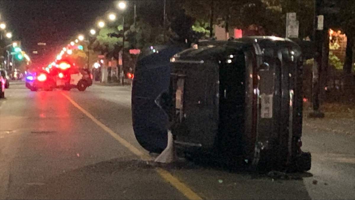 A vehicle seen on its side near Dundas Street and St Johns Place on Nov. 3, 2023.