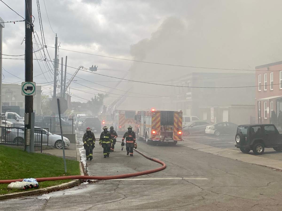 Firefighters at the scene of an industrial blaze in Toronto on Nov. 9, 2023.