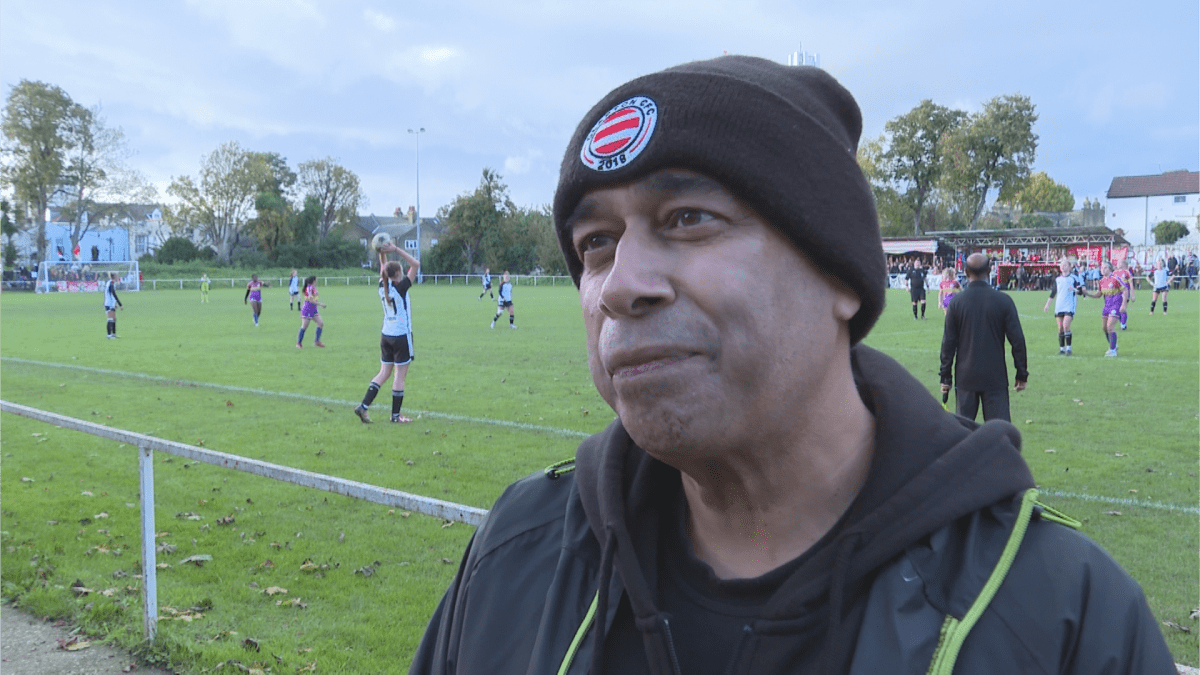 Sukhdev Johal stands on the touchline of The Old Spotted Ground soccer stadium during a game between Clapton Community Football Club and Fulham FC.