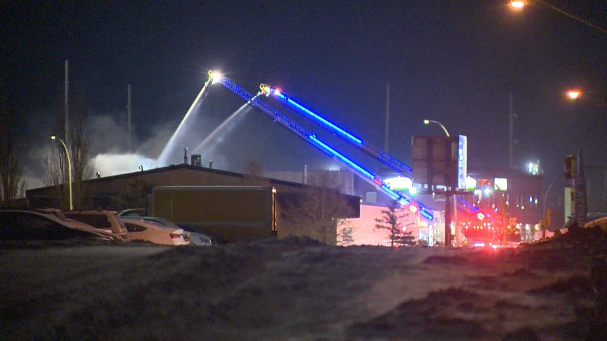 Regina fire crews battled a large fire Tuesday at the Battery Depot CAA building near Winnipeg Street and Dewdney Avenue.