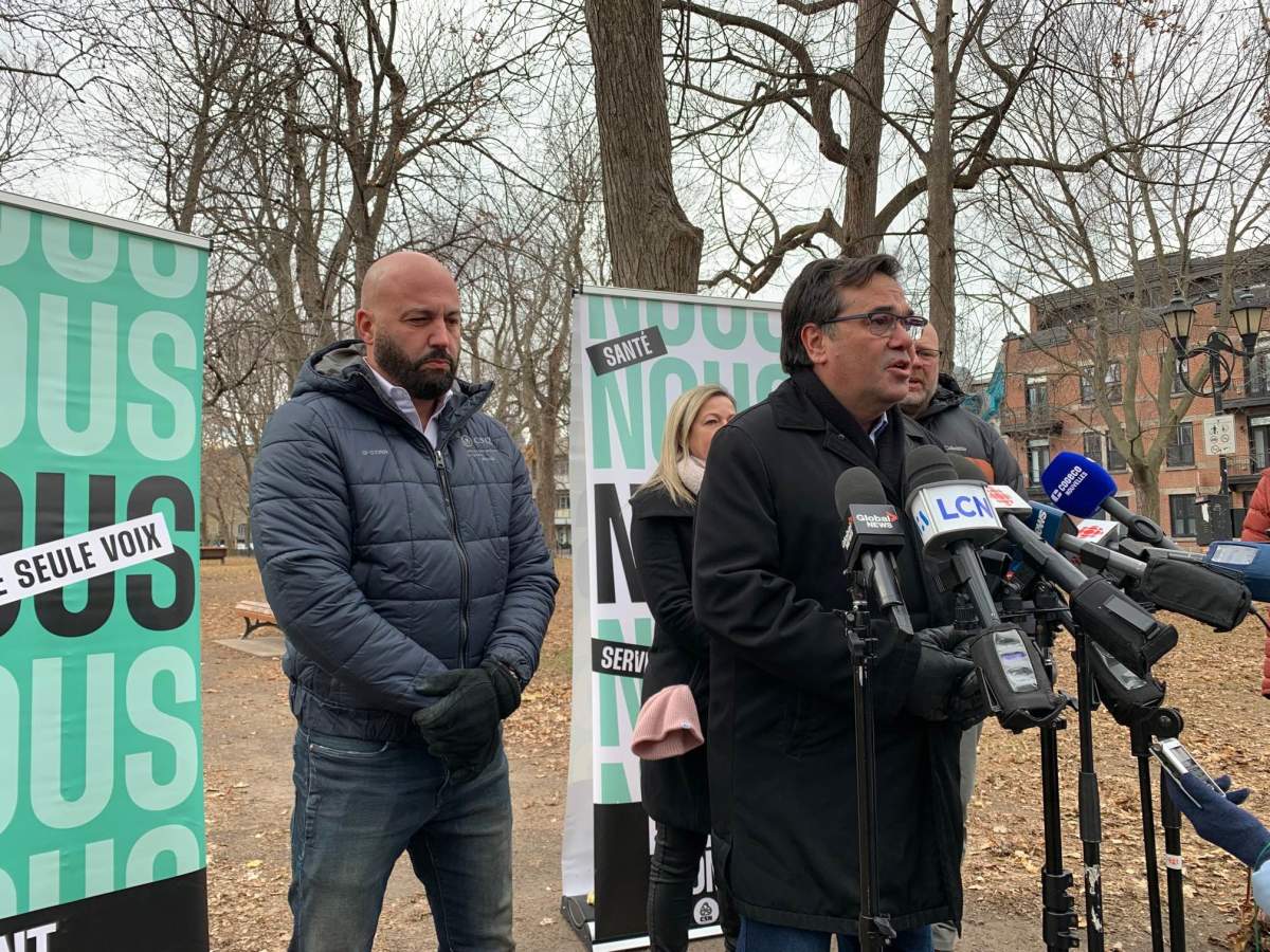The leaders of the Front Commun unions — which represents 420,000 public sector workers — speak to reporters on Nov. 28, 2023.