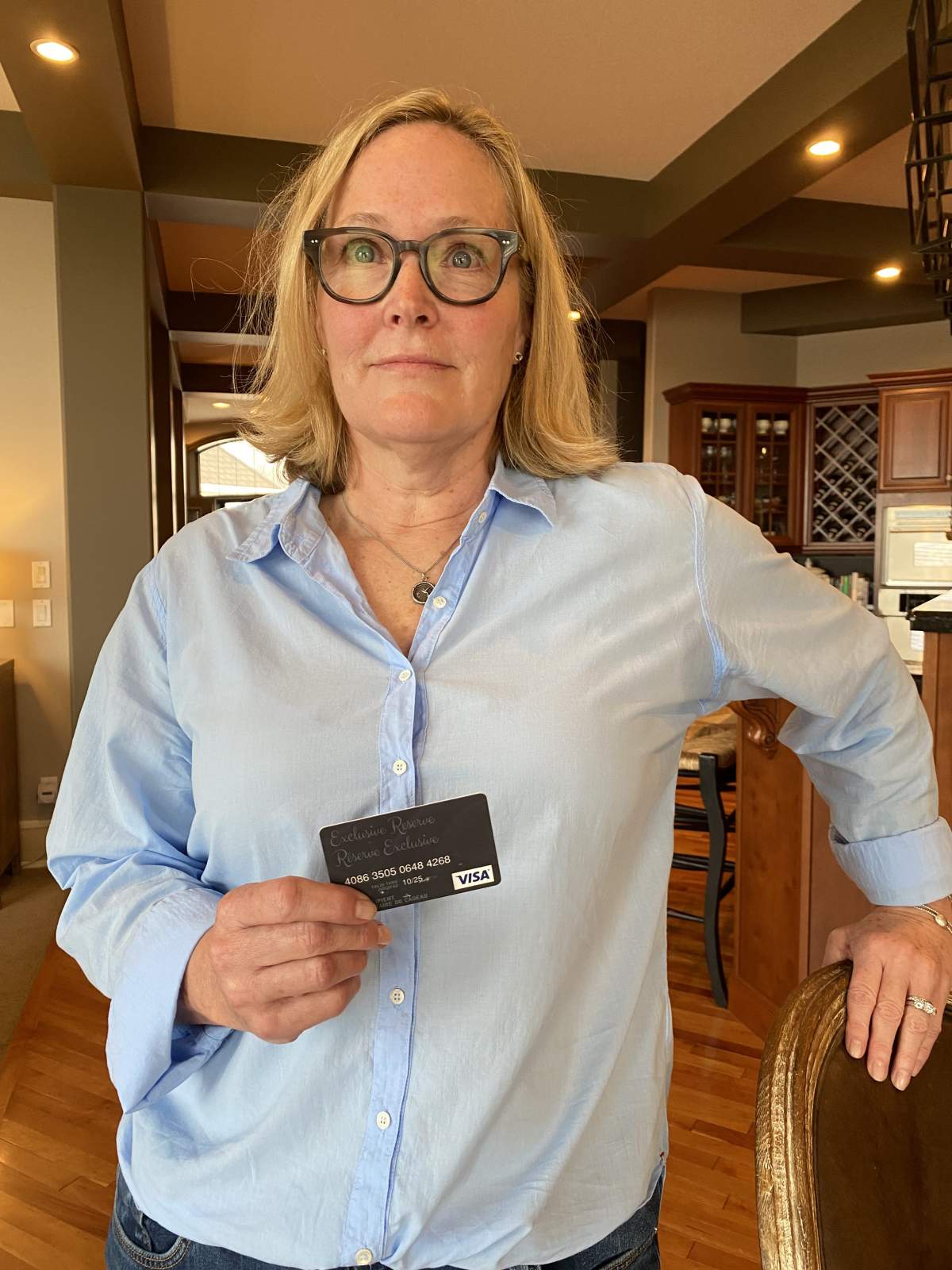 Kelli Borger with near-drained gift card