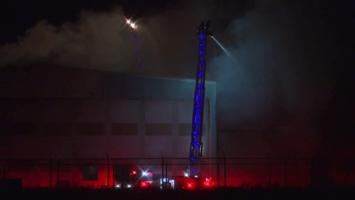 Firefighters battle a blaze in the Blatchford neighbourhood Thursday morning.
