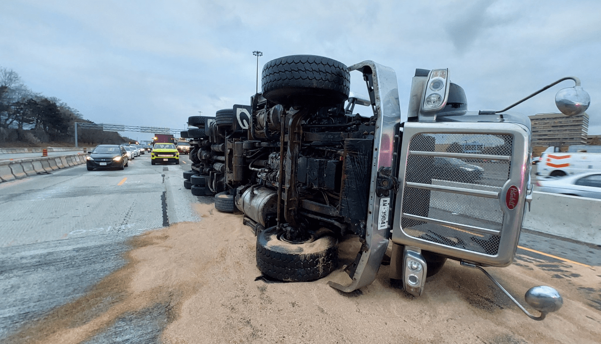 A transport truck rolled over on Highway 401 Monday evening, causing delays on a portion of roadway.