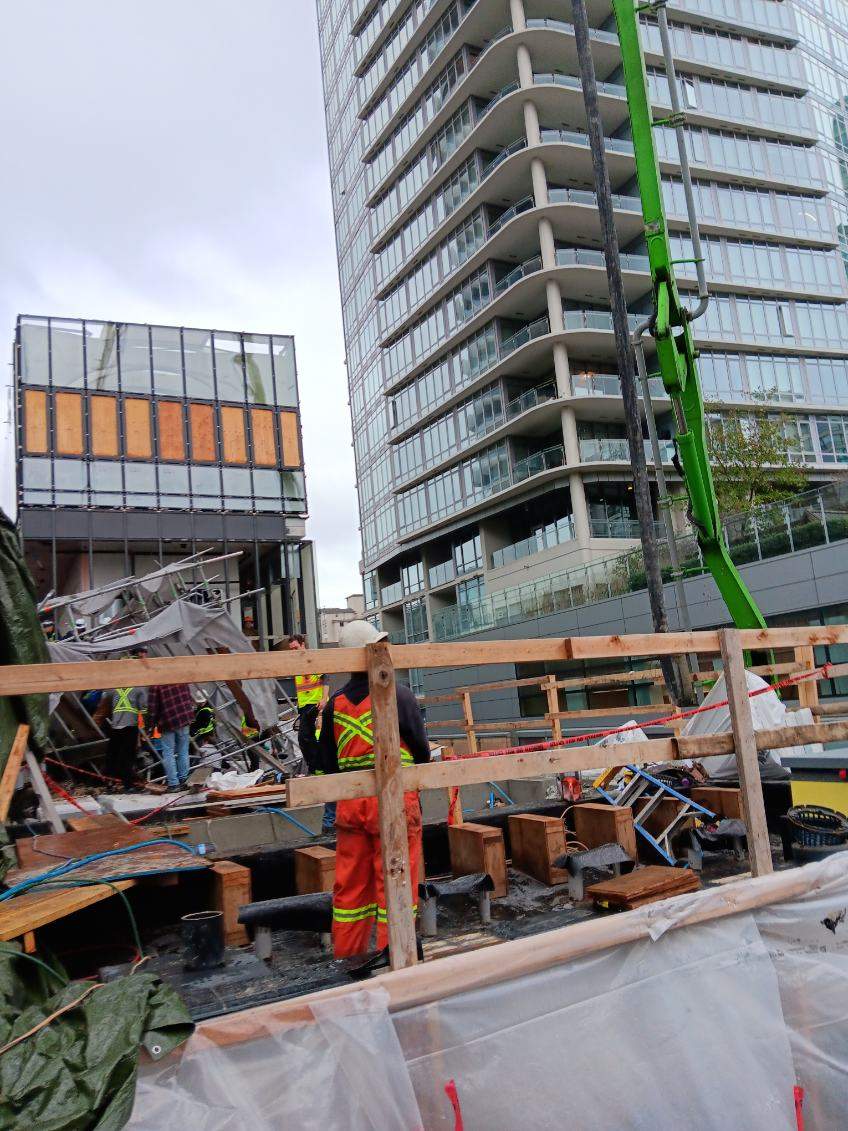 Photos from the scene show the aftermath of the scaffolding collapse.