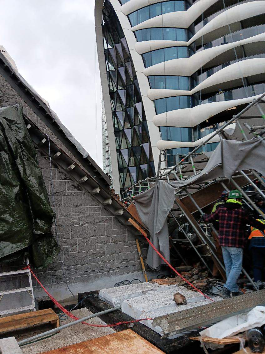 Photos from the scene show the aftermath of the scaffolding collapse.