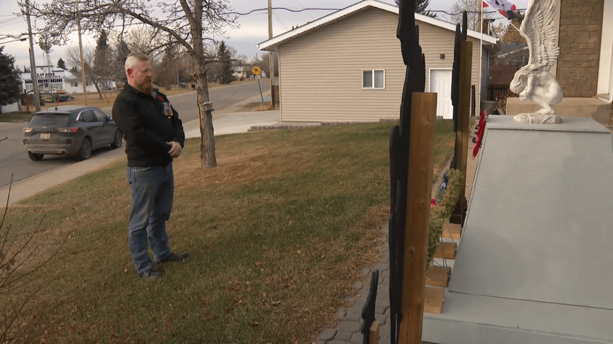 Darren Longstaff creates a Remembrance Day memorial in his yard each year.