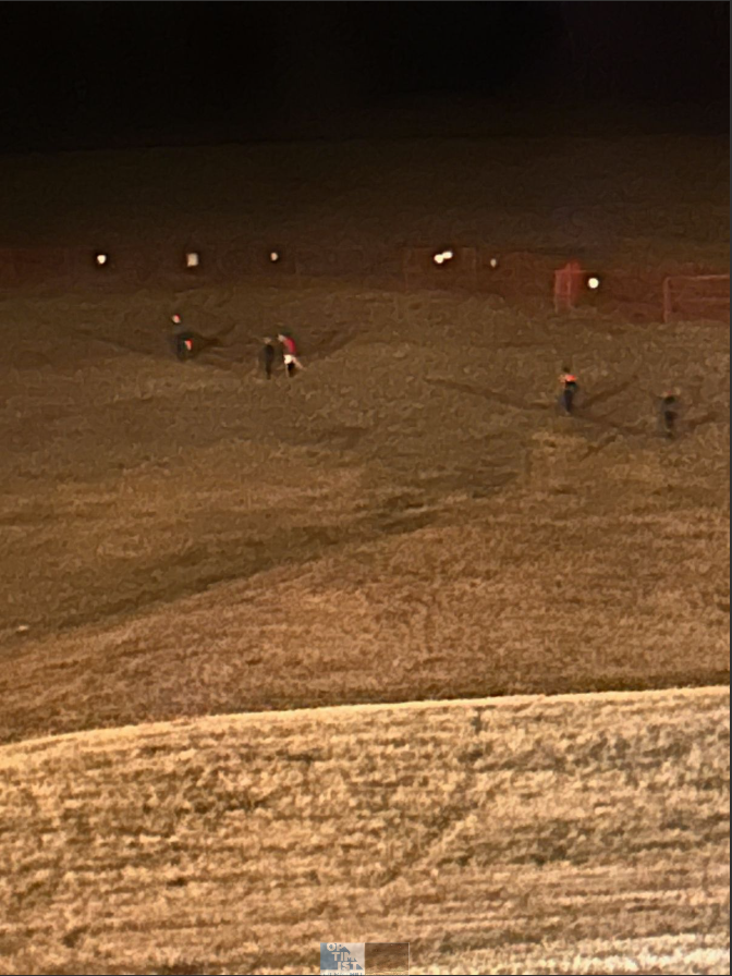 Security camera footage of kids sneaking onto Optimist Hill to play on the newly made snow.