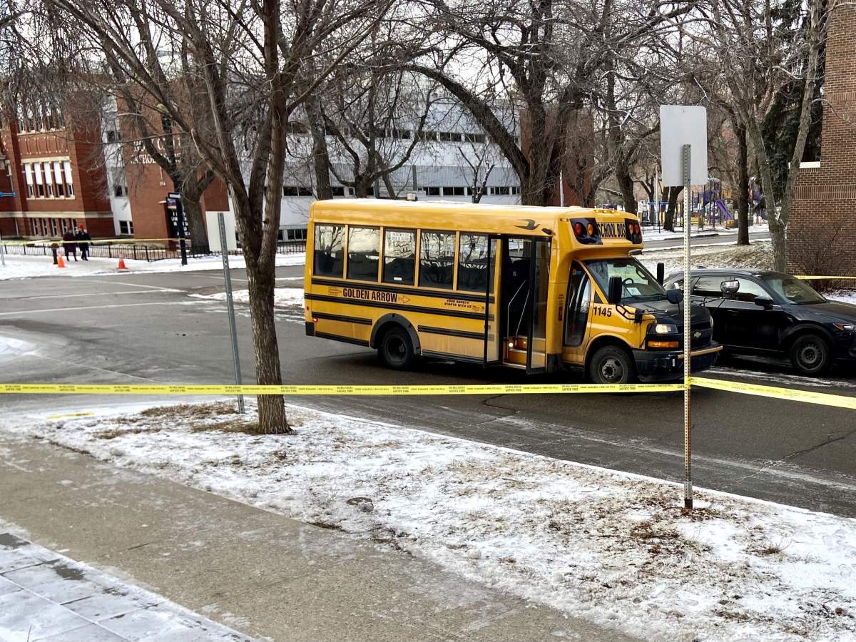 Collision between school bus and pedestrian near 110 Street and 99 Avenue on Dec. 8, 2023.