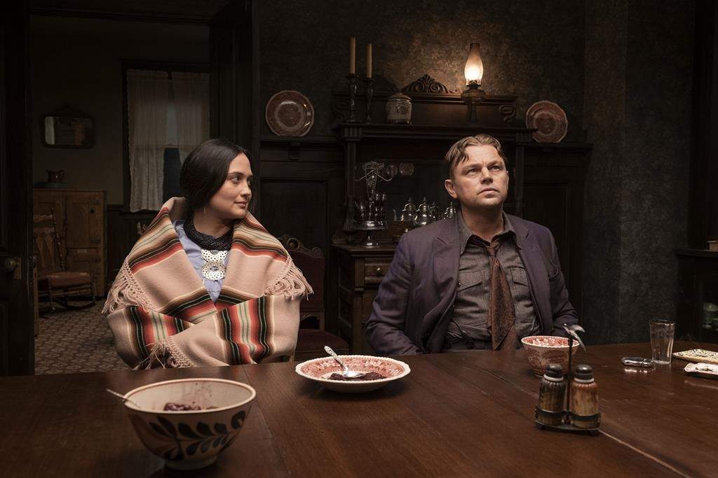 A photo of Lily Gladstone and Leonardo DiCaprio on the set of 'Killers of the Flower Moon.