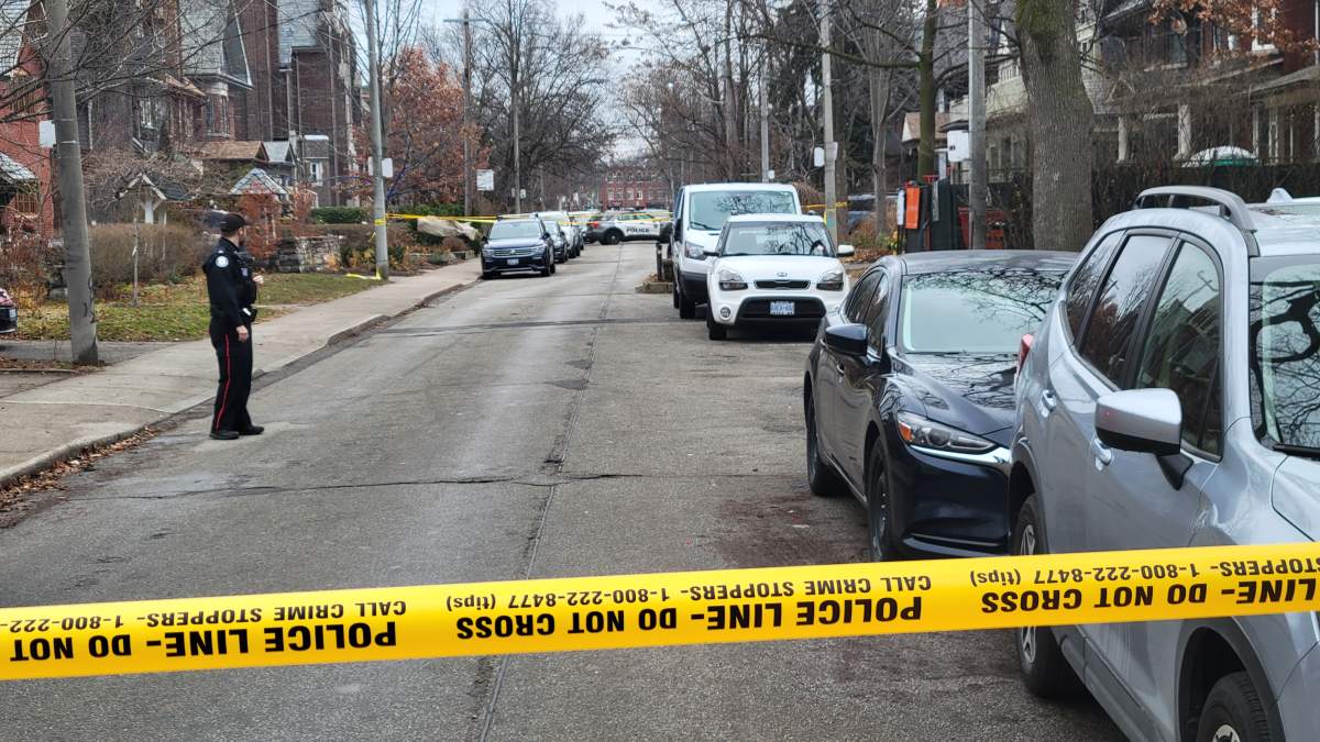Police block area after a Toronto cyclist was struck by an object on Dec. 26, 2023.