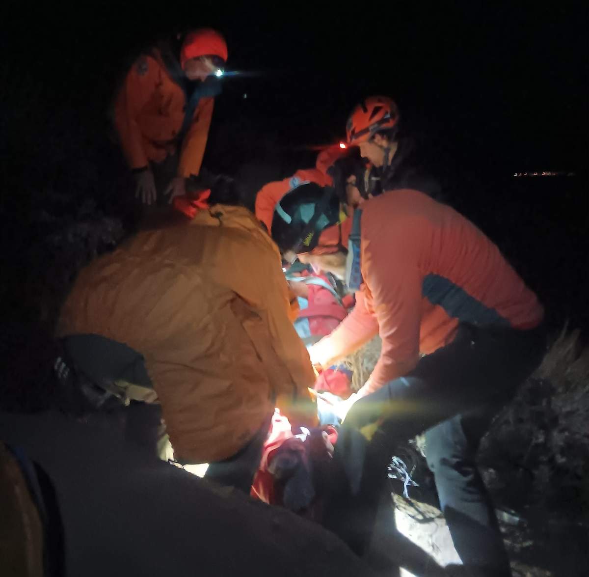 Search and rescue workers in Inyo County freeing a hiker who was trapped under a large boulder.