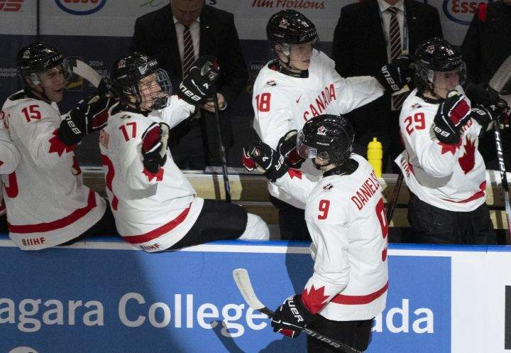 Canada's Nate Danielson (9) celebrates his goal against Finland with teammates during first period hockey action at the IIHF World Junior Hockey Championship in Gothenburg, Sweden on Tuesday, Dec 26, 2023.