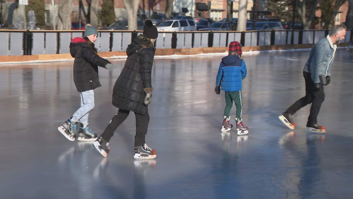 Some of the first skaters of the season glide across the Cameco Meewasin Skating Rink on Dec. 20, 2023.