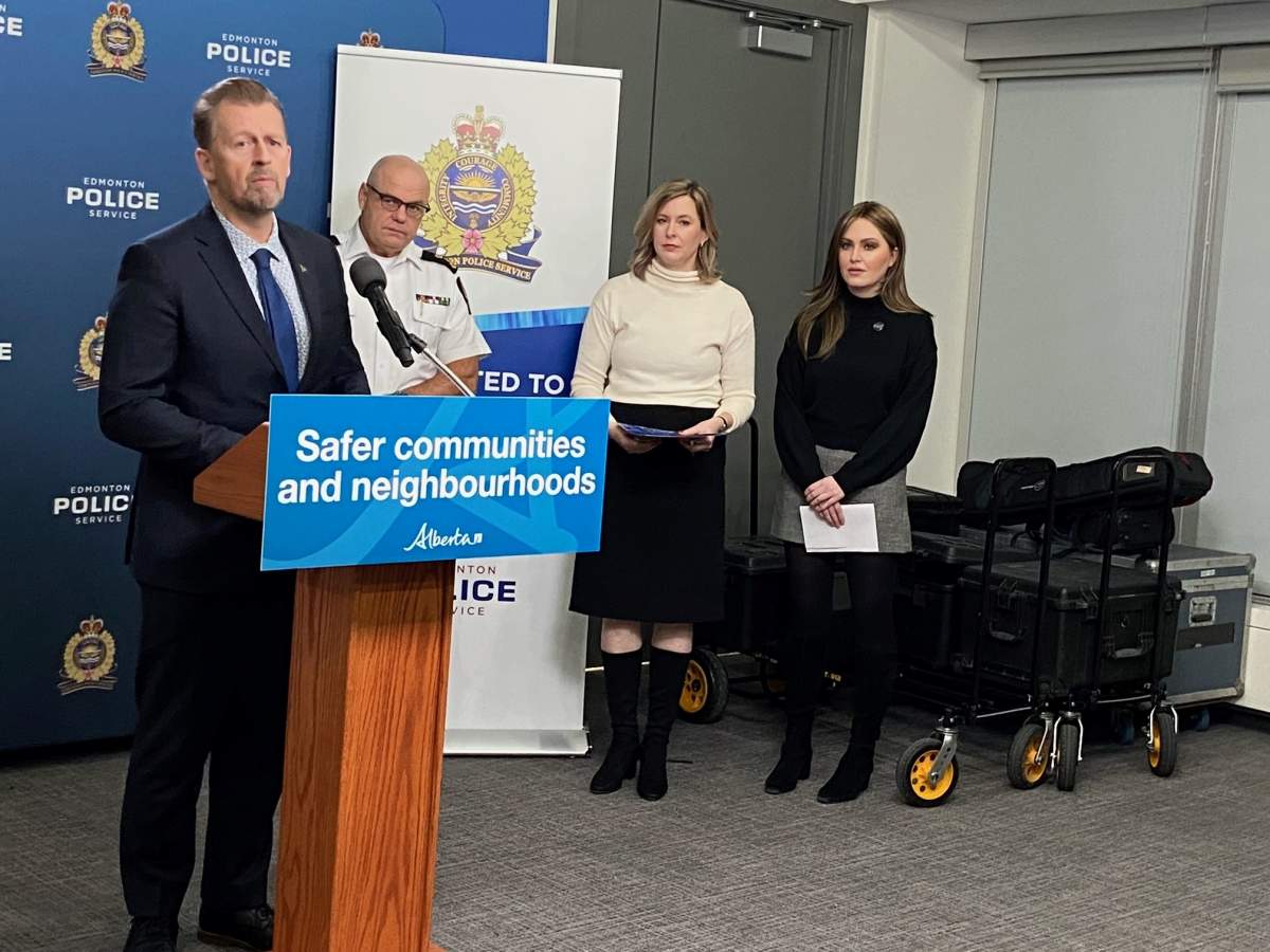 Alberta Public Safety and Emergency Services Minister Mike Ellis speaking at a news conference with Edmonton Police Service chief Dale McFee on Tuesday, December 12, 2023.