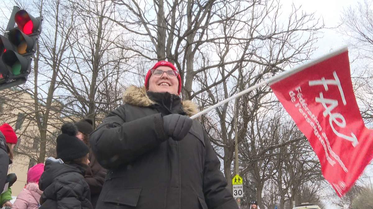 Parents joined teachers on the picket line in Montreal on Dec. 12, 2023.
