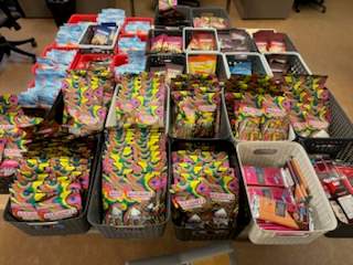 Police say roughly $49,000 worth of psychedelic mushroom products were seized in the raid.