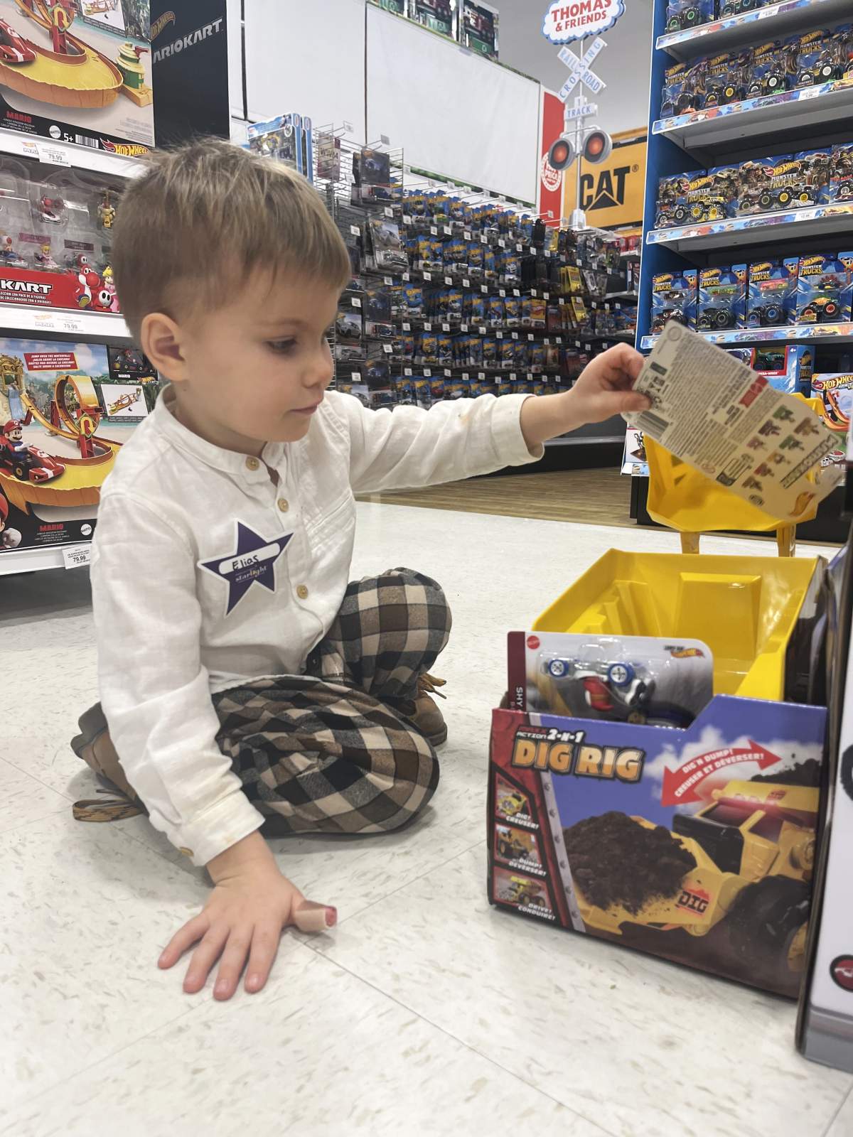Elias Demydenko, 3, family at the Starlight Children’s Foundation Canada 2023 Christmas shopping spree in Barrie’s Toys R Us.