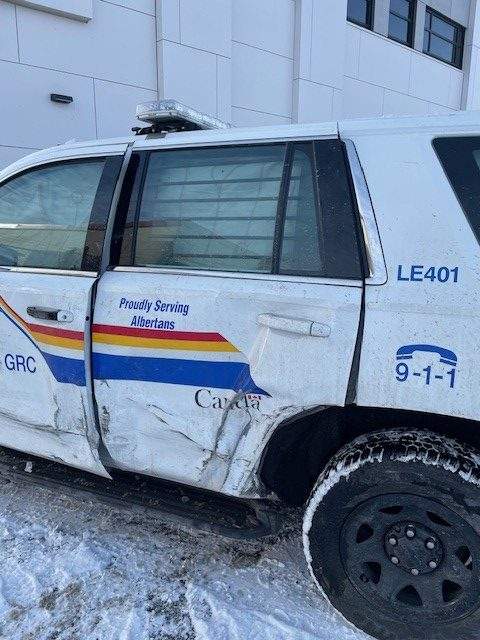 Alberta RCMP are once again reminding drivers to slow down and drive to road conditions after an RCMP officer's vehicle was struck by a passing truck on the QE2 Highway near Leduc Sunday night.