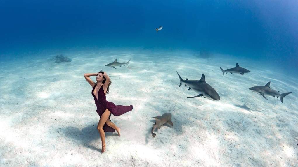 Kim Bruneau is photographed by Pia Oyarzun in a record-breaking deep sea photoshoot in Nassau, Bahamas.