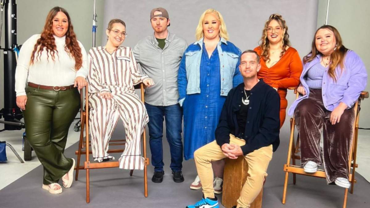 The 'Honey Boo Boo' family on set of a photoshoot. Anna 'Chickadee' Cardwell is sitting in a chair wearing matching pajamas.