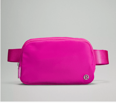 A Lululemon belt bag in pink.