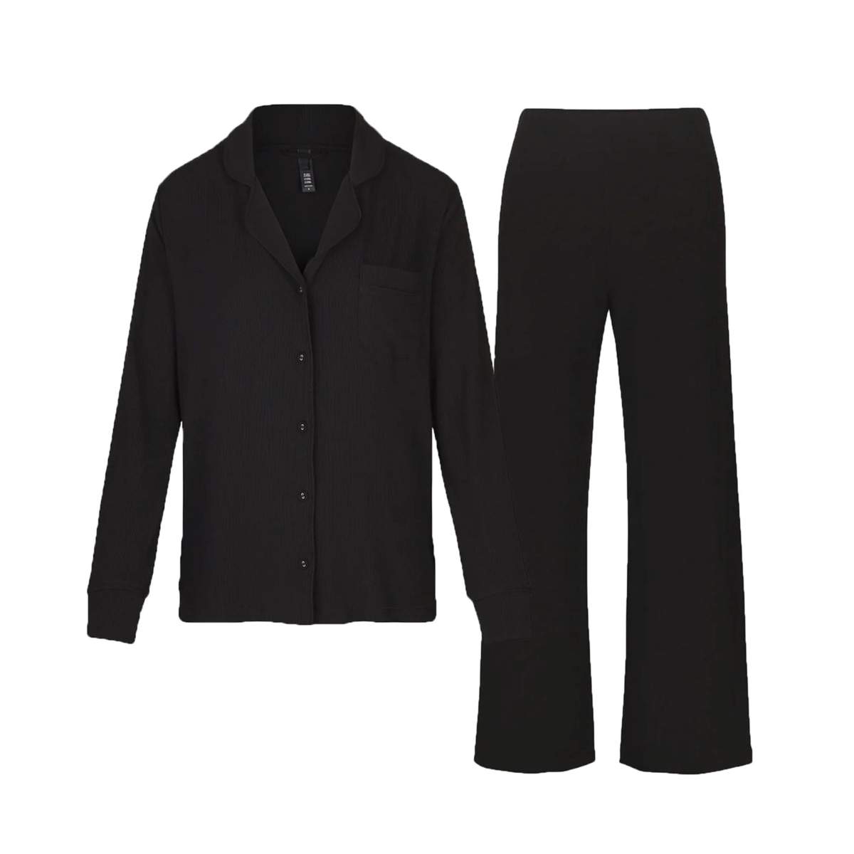 The Skims Soft Lounge Sleep Set in black.