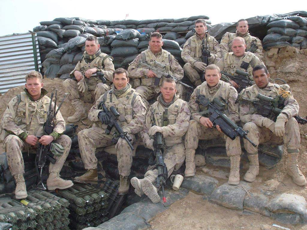 Lionel Desmond (front row, far right) was part of the 2nd Battalion of the Royal Canadian Regiment, based at CFB Gagetown and shown in this 2007 handout photo taken in Panjwai district between patrol base Wilson and Masum Ghar in Afghanistan.