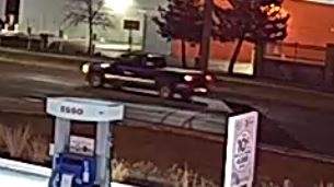 Police say a third suspect waited in a parked pickup truck across the street.