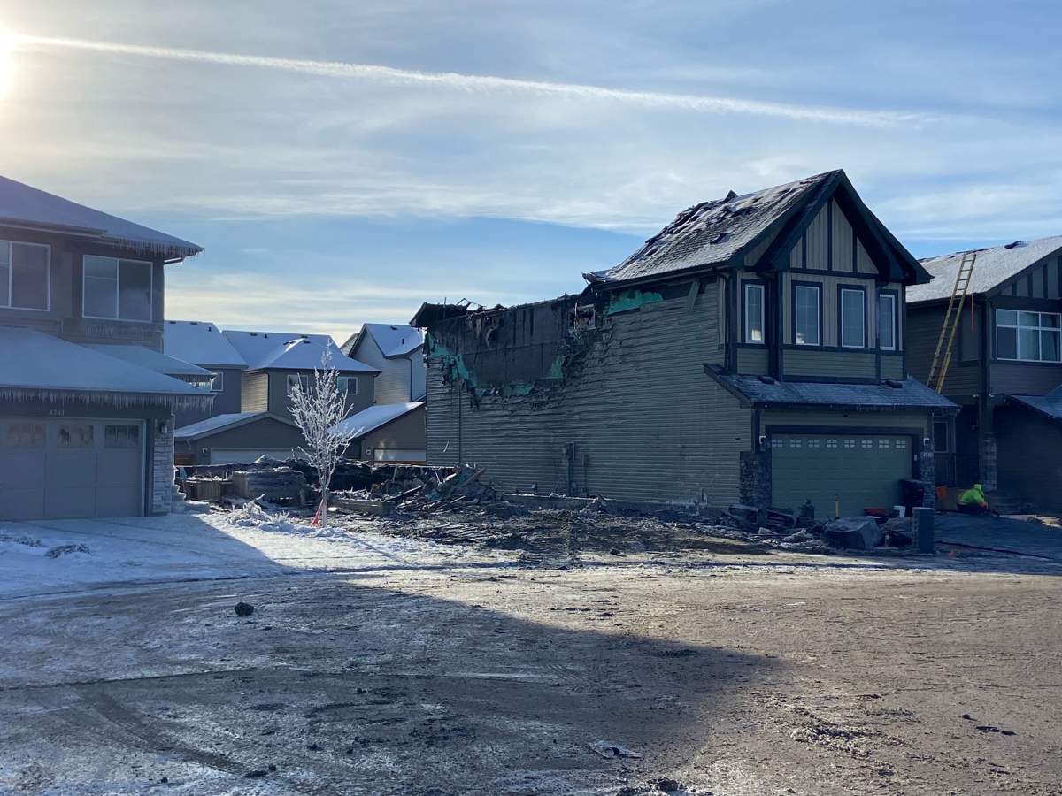 A home being built on Alwood Bend in deep south Edmonton's Allard neighbourhood was destroyed in a fire that left extensive damage to a neighbouring house as well on Sunday, Jan. 7, 2024. Photo taken Monday, Jan. 8, 2024.