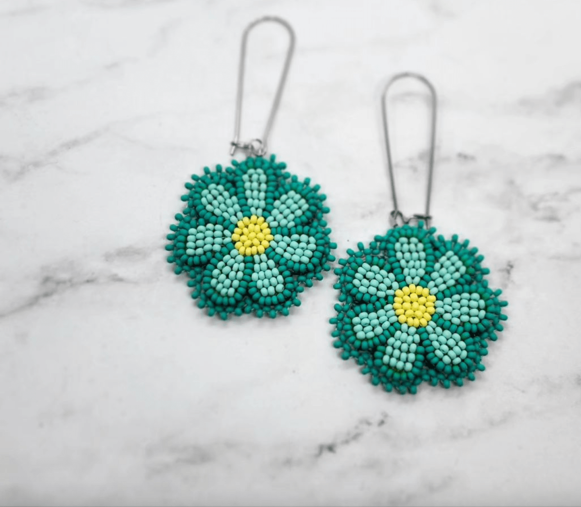 Local artist created earrings, Beading Neechis